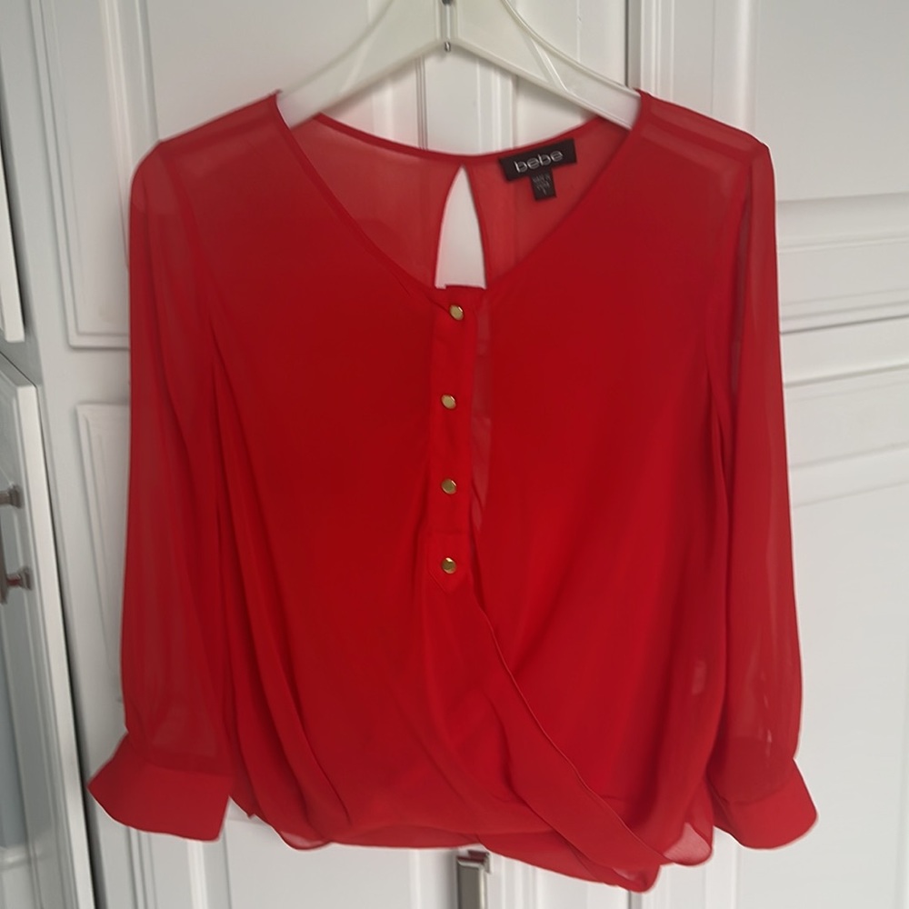 Bebe red blouse with open back size S
